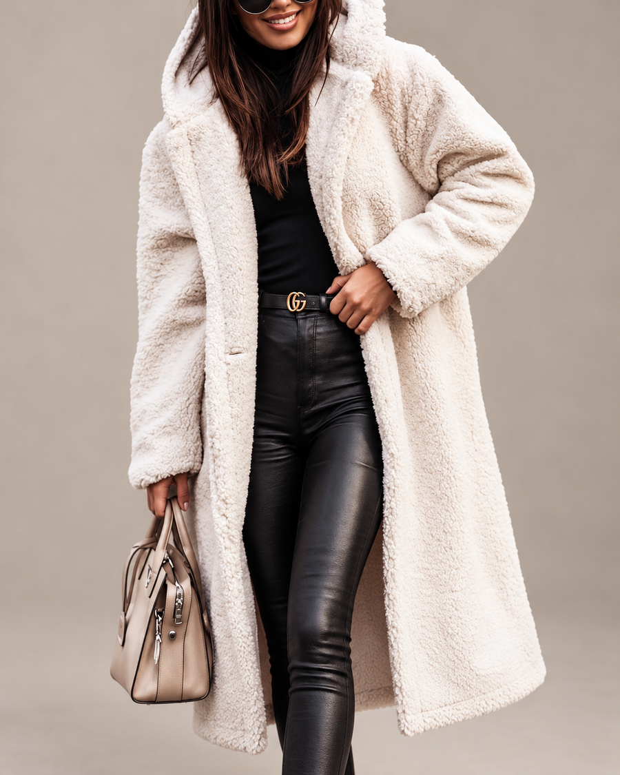 Studio presentation of cream longline teddy coat