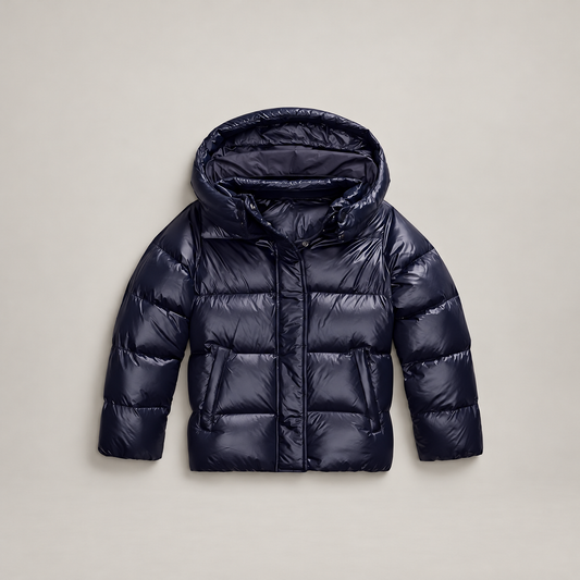 Studio presentation of dark blue hooded puffer jacket