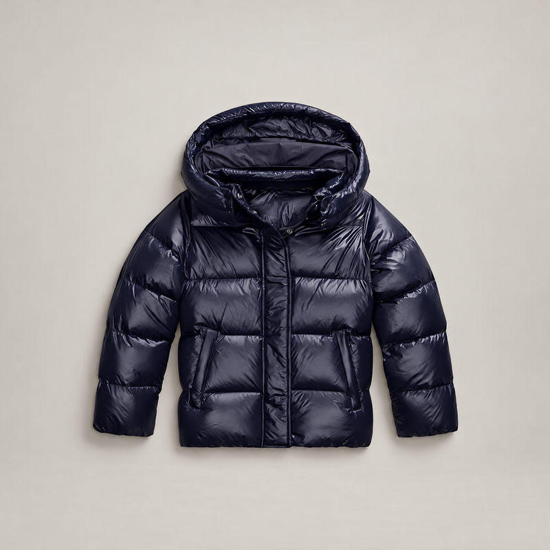 Studio presentation of dark blue hooded puffer jacket