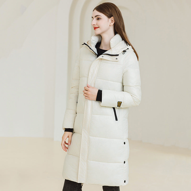 White longline hooded padded coat with black pocket zippers